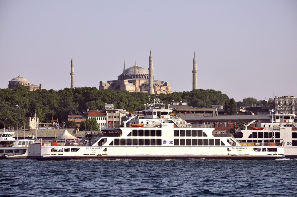 A ferry on the Bosphorus with the Sultanahmet skyline in Istanbul
