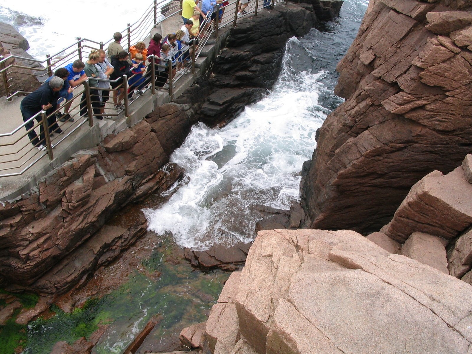 Waves surging into Thunder Hole along the coast of Acadia National Park